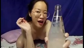 cute girl drinking water at home